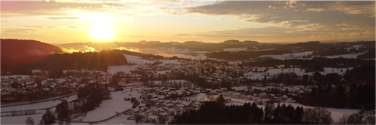 Header 072 Ortsansicht Winter Drohne Sonnenuntergang